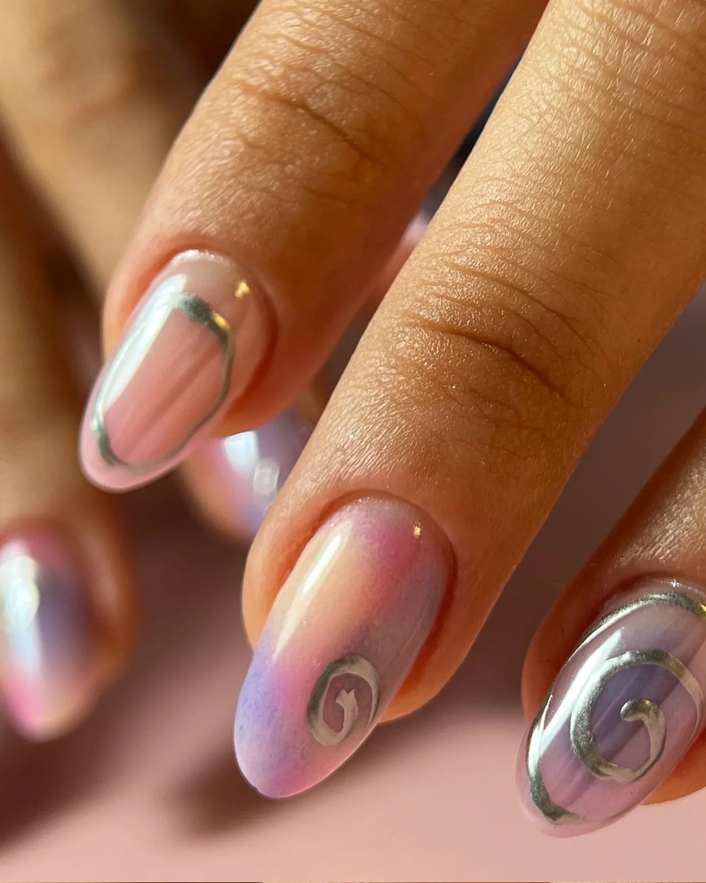 Pastel nails with silver chrome line art
